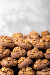 Cocoa and walnut cookies. Fresh walnut cookies. Bakery products. close up