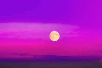 Fool Moon In Pink Magenta Cloudscape Sky Background. Magic Night View. Wizzard Conception. Violet Purple Scenery Background Moonrise Above Foggy Land.