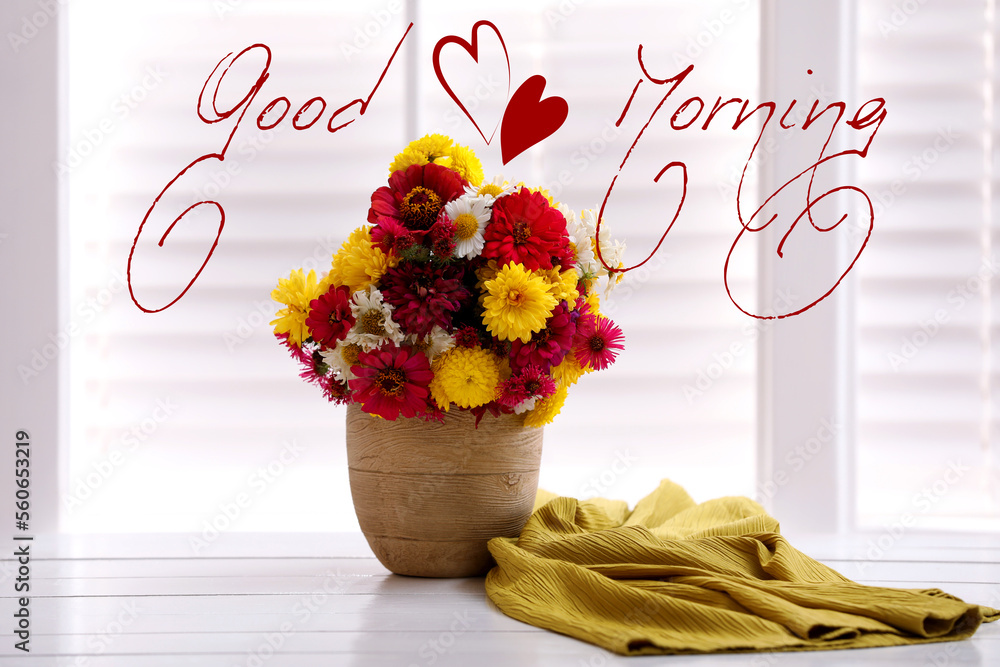 Poster Good morning! Beautiful bouquet and yellow cloth on white wooden table near window