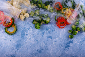 Different frozen vegetables. Food storage.