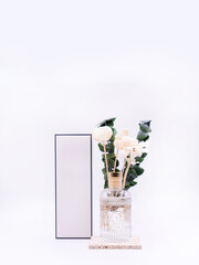 Aromatic reed air freshener on white background