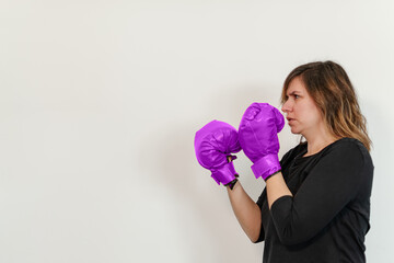 angry woman with boxing gloves