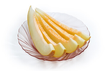 Several slices of melon on a pink glass dish