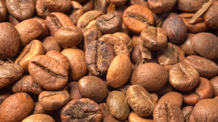 Roasted coffee beans. Camera above coffee beans close-up