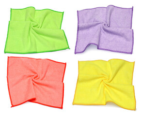 Set of fold multicolor micro fiber cloths yellow, green, red and purple for cleaning work isolated on white background.