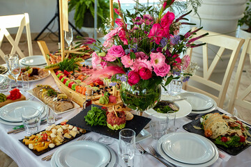 Served buffet table with various banquet dishes