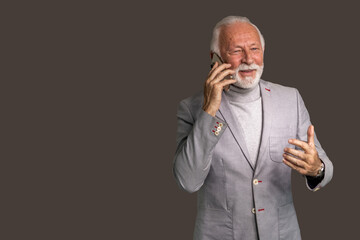 Senior businessman talking on the phone