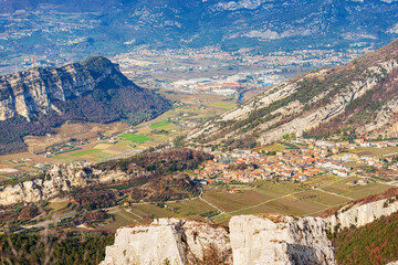 Aerial view of the small towns of Nago-Torbole and Riva del Garda, view from the mountain range of...