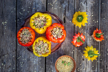 colorful stuffed paprika with meat and ptitim