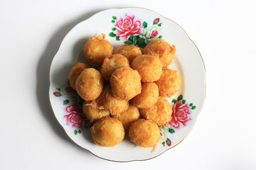 Indonesian food : Perkedel is fried patties, made of ground potatoes and minced meat and vegetables, isolated on white background.