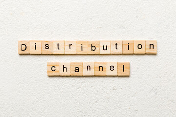 distribution channel word written on wood block. distribution channel text on table, concept