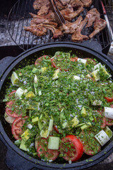 stew of lamb and vegetables in a cauldron. Khashlama. Armenian cuisine.