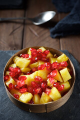Pineapple chunks and pomegranate seeds
