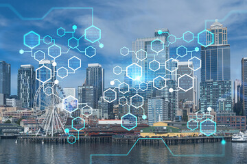 Seattle skyline with waterfront view. Skyscrapers of financial downtown at day time, Washington, USA. Decentralized economy. Blockchain, cryptography and cryptocurrency concept, hologram