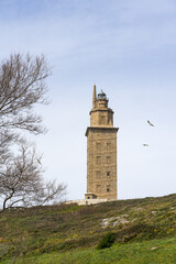 Hercules tower roman lighthouse in the city of A Coruña in a sunny day, Galicia, Spain.