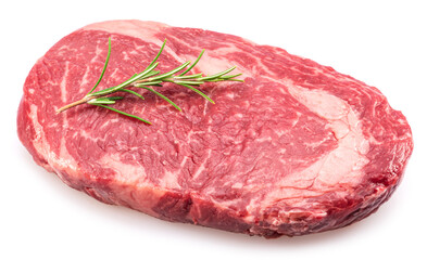Raw ribeye steak with rosemary twig on it on white background. Top view.