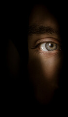 mystery eyes on dark background