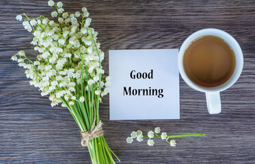 Good Morning Message , Bouquet of Lily of the Valley  and Cup of Coffee .Spring Morning Concept 
