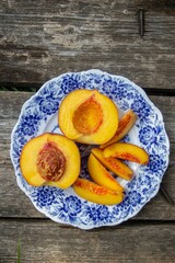 peaches in a vintage bowl