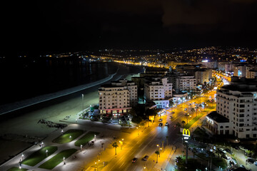 Aerial view over the city center Tanger at night in Morocco