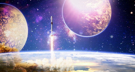rockets launch into space on the starry sky. spacecraft flies into space with clouds of smoke. Elements of this image furnished by NASA