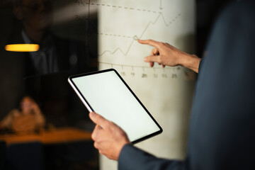 Close up of man using digital tablet