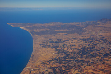 View from plane window with Cape Kormakitis in Cyprus island country