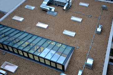 gravel mulch on roof of a flat green roof. covers and protects layers of insulation, decorative...
