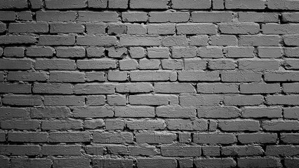 Black brick wall background texture with vignette.