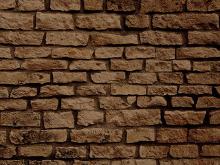 Brown brick stone wall texture background.