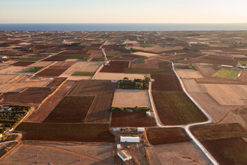 Drone view of fields with red soil around Avgorou village in Famagusta District in Cyprus island country