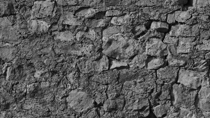 gray background, in the photo an old gray stone wall close-up