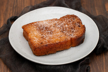 Baked or fried bread with sugar and cinnamon. Dessert called Rabanada.