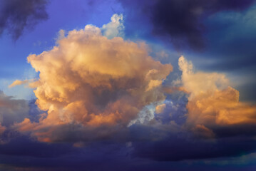 Fototapeta premium Religious image.Light from heaven,dramatic clouds, golden cloud blue sky,beautiful evening.Soft focus.Toned.