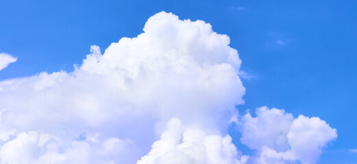 Naklejka na ściany i meble Background of White Clouds and Blue Sky