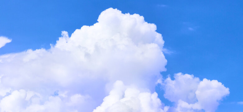Background of White Clouds and Blue Sky