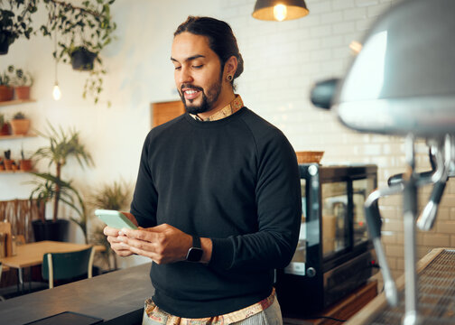 Startup cafe manager or man with phone for social media, networking or company blog content review. Happy, smile or coffee shop employee with smartphone for social network, research or mobile app