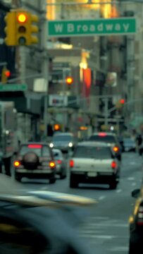 Busy street in New York City, vehicles and pedestrians, vertical short video