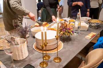Decorated New Year's table with golden candles