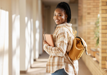 College student portrait, black woman and university with books and backpack while walking at campus. Young gen z female happy about education, learning and future after studying at school building - obrazy, fototapety, plakaty