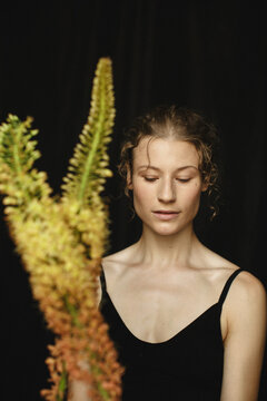 Beautiful woman with yellow flowers