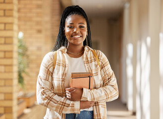 Face, student portrait and black woman in university ready for learning, goals or targets. Education, scholarship and happy female learner from South Africa with books for studying and knowledge.