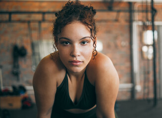 Fototapeta Fitness, exercise and portrait of a woman at gym for a workout and training for healthy lifestyle and body wellness. Face of sports female or athlete at health club for balance, energy and power obraz