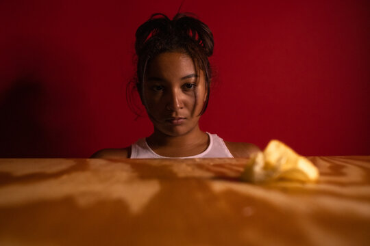 Young woman looking at chip