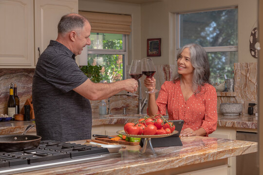 Mature Couple Cooking Together 