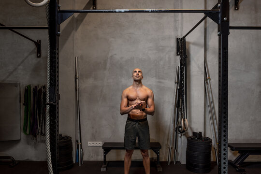 Sportsman preparing to do pull ups