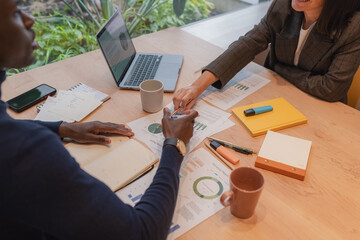 Diverse businesspeople discussing financial report