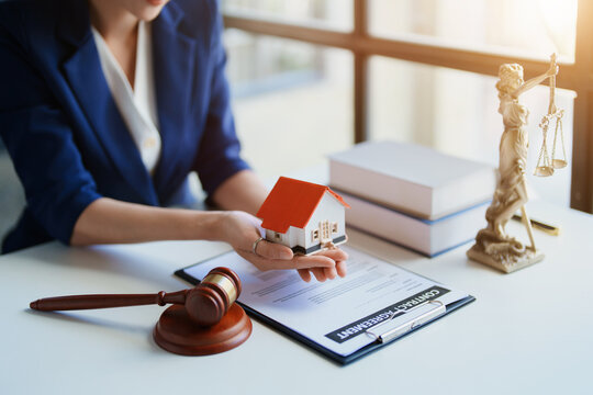 Law, Consultation, Agreement, Contract, Concept Attorney or Lawyer is sitting and accepting complaints from clients for home and land matters in court.