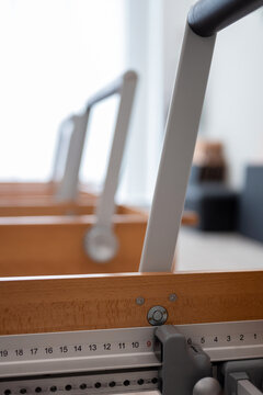Pilates reformers in light studio