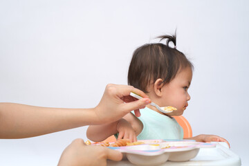 Nutrition healthy eating habits for kids concept. baby do not like to eat food. Little cute kid...